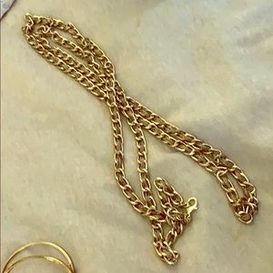 Long chain gold necklace